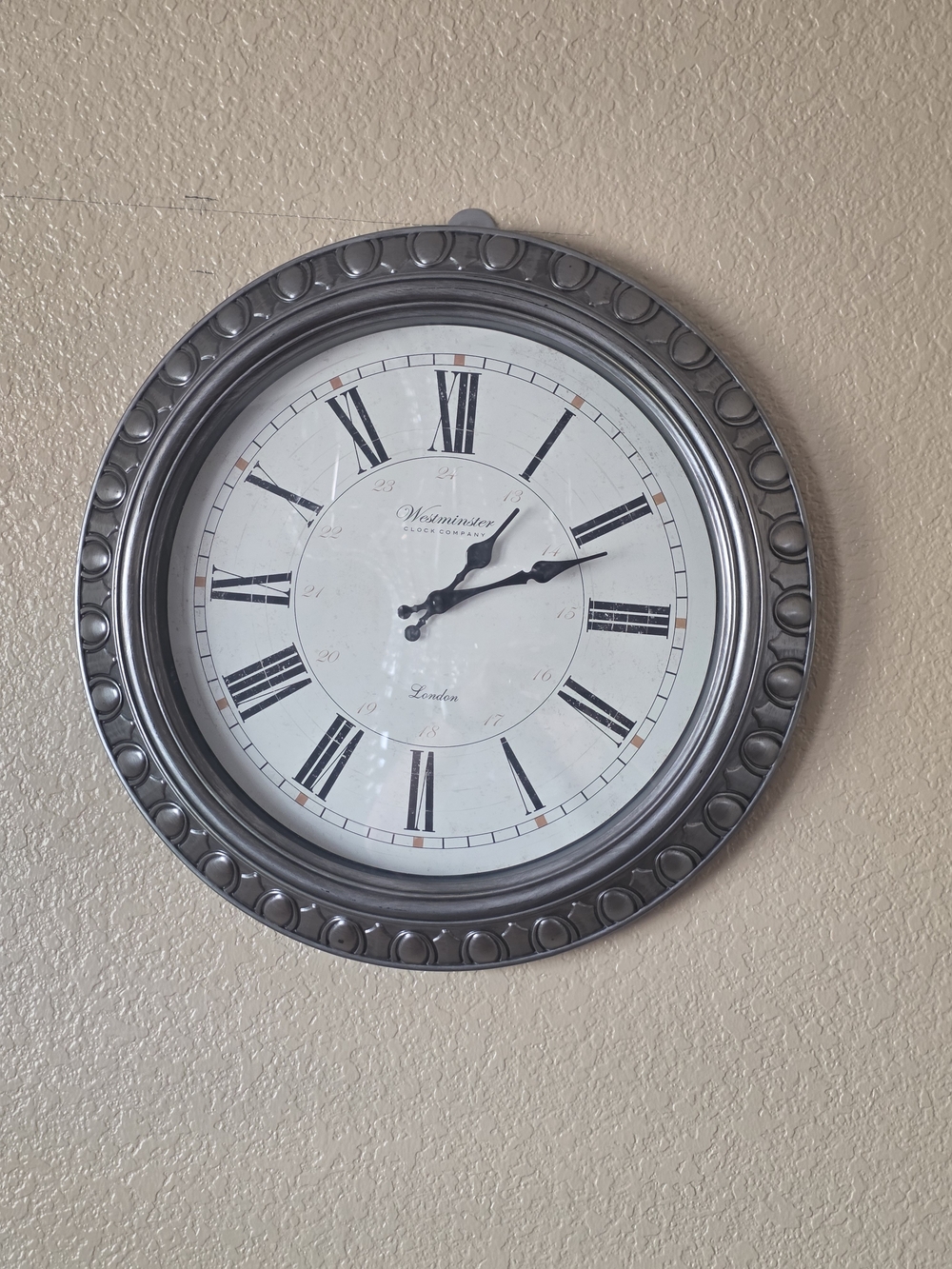 Source Unknown Silver and White Roman Numeral Wall Clock